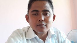 Rusly Junus, S.Pd (Kepala SMPN 2 Biau)
