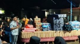 Bupati Bolmong, Yusra Alhabsyi saat meberikan sambutan usai memberikan santunan korban kebakaran di Bakan, Minggu (11/5/2025) Foto :IST