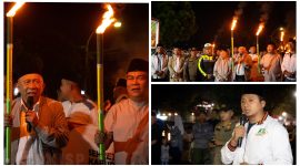 Foto Tampak Wabup bersama Sekda Ramli Tongko Lepas peserta pawai Obar
