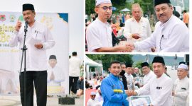 Foto Saat Asisten II Mujiono Lasitata,berikan Sambutan Bupati Banggai dan Penyerahan Hadiah bersama Kabag Kesra Rifai Mahiwa