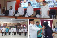 Foto Wabup Banngai Drs H.Furqnuddin di dampingi Kaban BKD Safrudin Hinelo.S.STP.M.Si semakin tanda dimulainya Bimtek pada salah seorang peserta