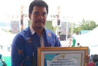 Foto Kepala Cabang BRI Luwuk usai menerima Penghargaan kategori Perbankkan perduli Perempuan dan anak Indonesia di HAN ke 41