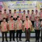 Foto Ketua Kwarcab Pramuka Banggai, Syafrudin Hinelo, bersama ketua-ketua mabiran, mabigus, dan pimpinan saka se-Kabupaten Banggai.