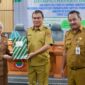 Foto Selda Banggai Moh.Ramli Tongko Bersama Asisten II Mujono Lasitata, serta Kadisperkimtan Ir Hj Maryam Salat