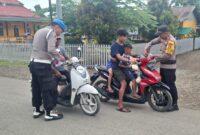 Sambut HUT RI ke-80, Polsek Paleleh Bagikan Bendera Merah Putih (Foto:Ist)