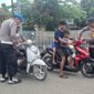 Sambut HUT RI ke-80, Polsek Paleleh Bagikan Bendera Merah Putih (Foto:Ist)