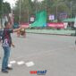 Foto Kapolres banggai AKBP Putu Hendra Binangkari.S.I.K Sebelum melepas Kelas Sport RX King Ia menyampaikan di depan para pembalap dan warga masyarakat yang menonton balap 