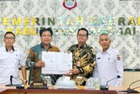 foto istimewa  : Plt. Asisten Administrasi Umum Sekretariat Daerah Kabupaten Banggai, H. Damri Dayanun, S.H., M.H.,Direktur Jenderal Pajak, Bimo Wijayanto,
