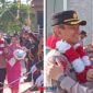 foto istimewa : Tampak AKBP Wayan bersama istri dalam penyambutan pedang pora dan bertemu pejabat lama AKBP Putu penuh keakrapan 