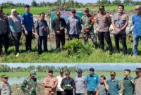 foto istimewa : Humas Polres banggai ini para aparat saat turun lapangan cek lokasi tanah