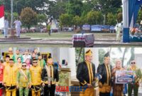 foto istimewa : Bupati Ir H.Amirudin.SP.MP.MM, saat pimpin Upacara bersama unsur Forkopimda sekaligus Serahkan Pemenang undian hadiah motor didampingi Kadisdikbud Safrudin Hinelo.S.STP.M.Si