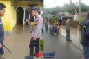 foto istimewa : Anggota Polsek Balantak turun langsung cek TKP Banjir
