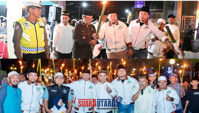 foto istimewa : Mewakili Bupati Banggai, Asisten Pemerintahan dan Kesejahteraan Rakyat Setda Banggai, Mujiono, secara resmi melepas peserta pawai obor didampingi para Pengurus PHBI