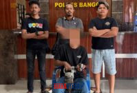 foto istimewa : Tersangka pencurian alat Bengkel di amankan anggota resmob polres banggai
