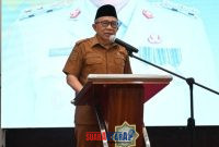 Wabup Banggai Drs H Furqanuddin.MM Saat Bacakan Sambutan Bupati di hadapan para tamu undangan 