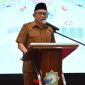 Wabup Banggai Drs H Furqanuddin.MM Saat Bacakan Sambutan Bupati di hadapan para tamu undangan 