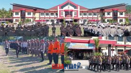 foto istimewa : Pimpin Upacara HUT Bhayangkari Ke 80 Kapolres banggai AKBP Wayan Wayracana Aryawan.S.I.K dan saksikan Defile pasukan upacara 