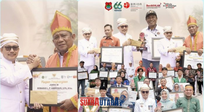 foto istimewa : Bupati Ir H.Amirudin.SP.MP.MM kepada Bambang Abdullah Camat toili barat