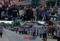 foto istimewa : Saat Kapolsek bersama Anggota Polsek batui buka Palang Jalan yang dipasang yang ditutup masa aksi demo