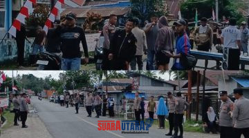foto istimewa : Saat Kapolsek bersama Anggota Polsek batui buka Palang Jalan yang dipasang yang ditutup masa aksi demo