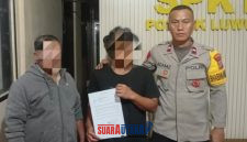 foto istimewa : Kedua pelaku bertengkar di damaikan oleh Anggota polsek luwuk