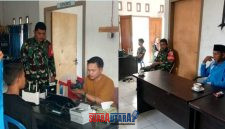 foto istimewa : Anggota Babinsa sedang lakukan foto warga
