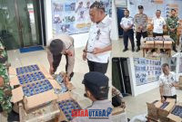 foto istimewa  : Waspel Deni Bersama Tim Gabungan saat periksa barang Seludupan minuman Cap Tikus antar Provinsi 
