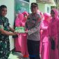 foto istimewa : Kapolsek Kintom Bersama Jajarannya dan Camat  Serahkan Kue HUT TNI 81di kantor koramil 
